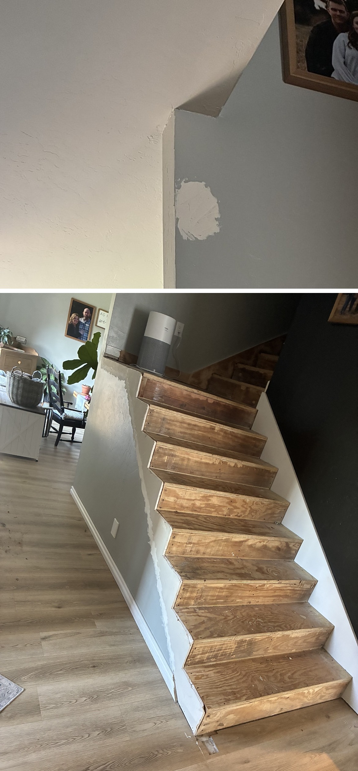 Staircase wall repairs being smoothed out, ready for paint